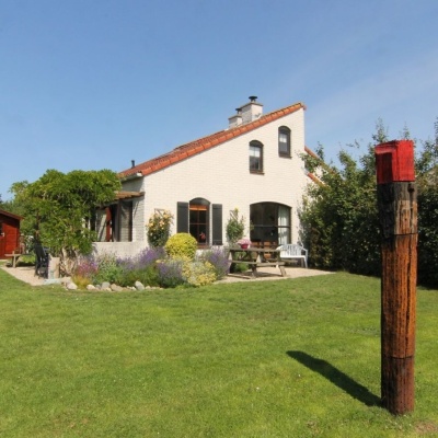 VAKANTIEHUIS de Krim 577 Texel tuin met paal