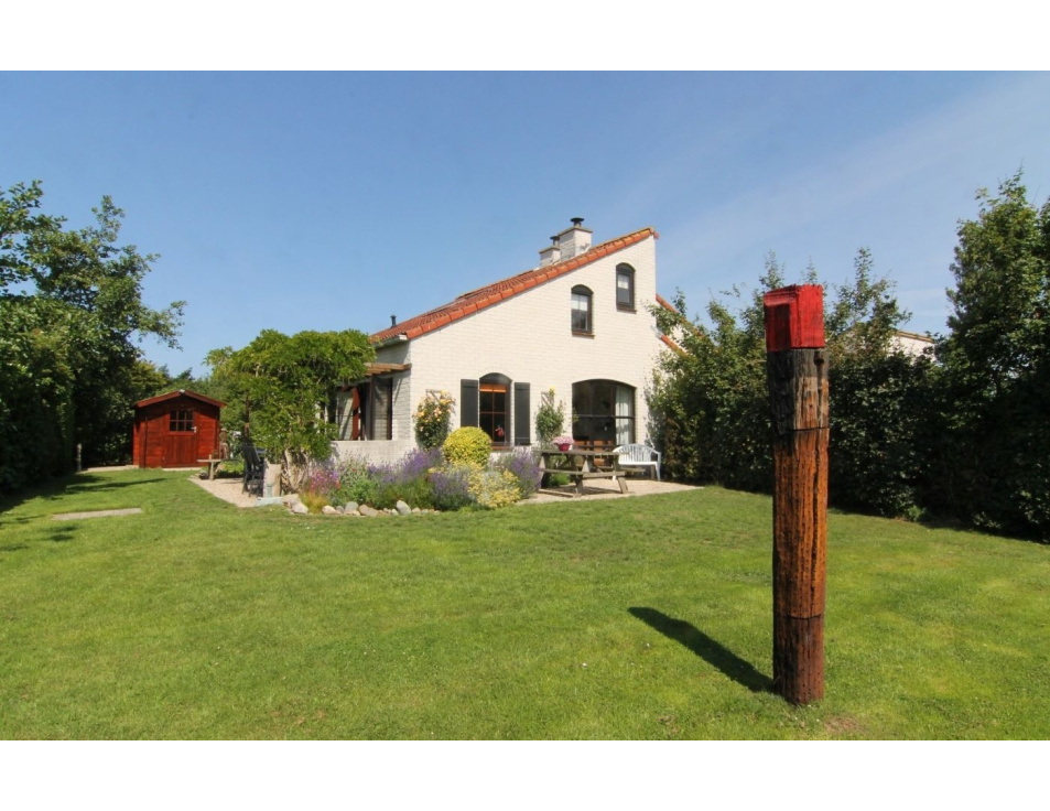 VAKANTIEHUIS de Krim 577 Texel tuin met paal