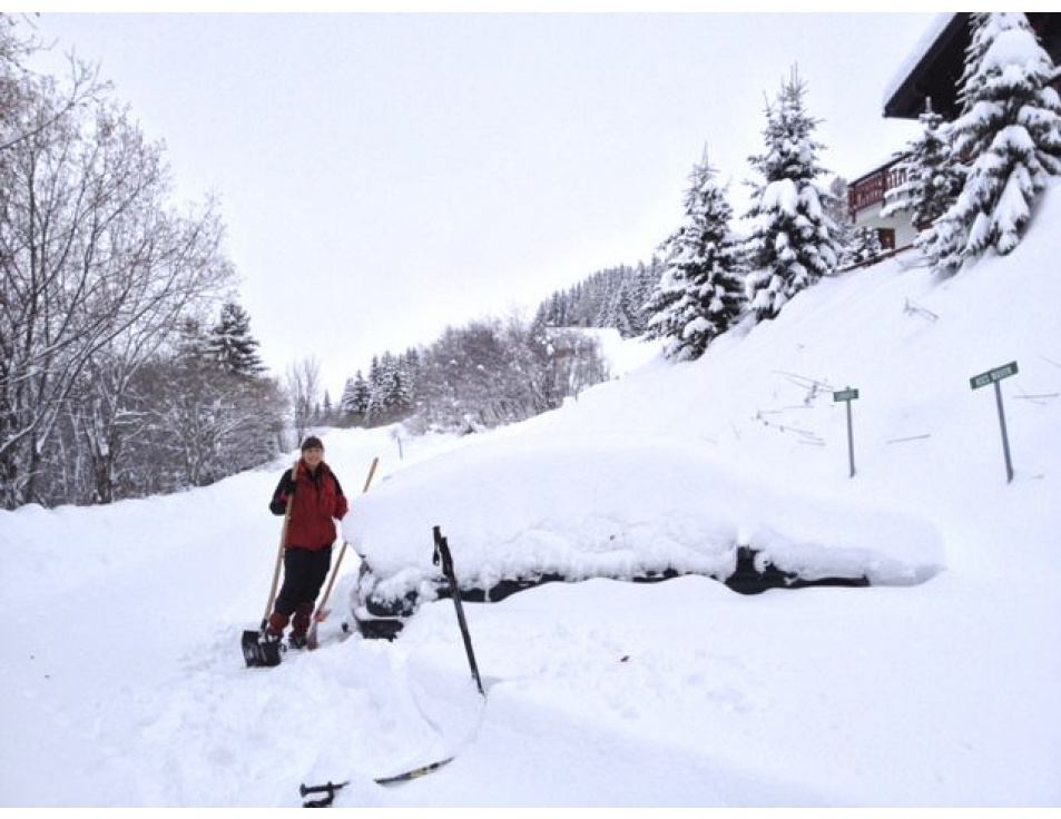 Chalet winter parkeerplaats